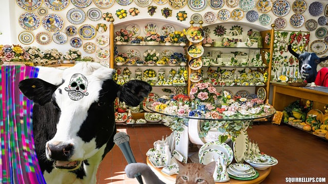 What's Your New Year's Resolution? 4 Red cat interviewing a cow inside of a China Shop.